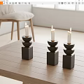 Modern Black Candle Holders Set of Three on Wooden Table with Lit Candles