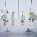 Various Stylish Table Lamps Showcasing Diverse Designs On Modern Display Table