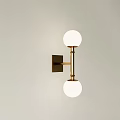 Modern Brass Wall Lamp with Double White Globe Shades and Metal Bracket