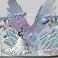 Elegant Floral Installation With Wing Shaped Decor And Soft Colored Blooms