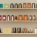 Various Tea Packages And Containers On Shelf Display With Different Colors