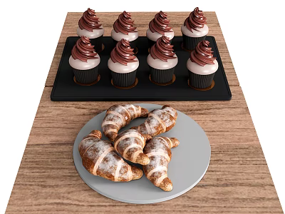 Tray Of Cupcakes With Chocolate Frosting And Plate Of Powdered Sugar Croissants On Wooden Table 3d model