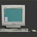Vintage White Computer System With Turquoise Screen Keyboard And Mouse