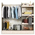 Organized Wardrobe Interior With Hanging Clothes Folded Towels Storage Basket And Accessories