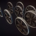 Multiple Vintage Industrial Metal Wheels With Spokes And Metallic Finish