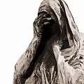 Detailed Hooded Cloaked Figure Sculpture With Hands Covering Face And Smoke