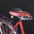 Red Classic Bicycle With Brown Leather Seat Vintage Handlebars And Urban Design