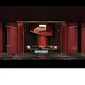 Luxurious KTV Room Interior With Red Backdrop Golden Chinese Characters And Black Sofa