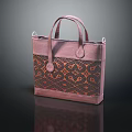 Elegant Pink Handbag With Intricate Brown Orange Patterns And Leather Handles