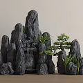Black Rockery Stones With Layered Structure And Green Plants For Outdoor Garden Decoration