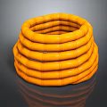 Orange Multiple Layered Spiral Stacked Tubular Object With Bamboo Texture On Dark Background And Reflection