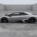 Silver Sports Car Convertible with Sleek Aerodynamic Design in Modern Indoor Showcase