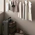 Clothes Hanging On Hangers With Suitcases And Handbags In Closet Area