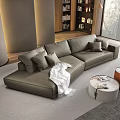 Modern Living Room With Asymmetric Leather Sofa Pillows And Throw Blanket