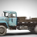 Vintage Blue Truck With Wooden Cargo Bed And Worn Out Exterior