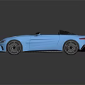 Aston Martin Blue Convertible Sports Car With Sleek Exterior Open Top And Black Wheels