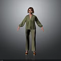 Woman In Green Blouse And Green Pants With Short Brown Hair On Gray Background