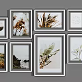 Various Size Photo Frames With Different Designs And Decorative Art Arranged On Gray Background