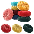 Colorful Round Velvet Pillows Stacked In Various Bright Tones For Home Decor
