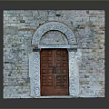 Stone Wall Gate With Arched Top Red Wooden Door And Carved Stone Details