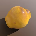 Ripe Shiny Yellow Fruit With Natural Dark Spots On Gray Background