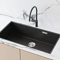 Sleek Black Undermount Kitchen Sink With Modern Faucet On Marble Countertop