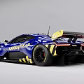 Blue And Yellow Monster Race Car With Aerodynamic Design And Rear Wing