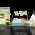 Spring Themed Booth With Teepee Tent String Lights And Decorative Signs 3d model
