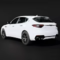 White Maserati SUV With Sleek Sporty Exterior And Black Alloy Wheels