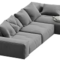 Gray Upholstered L shaped Sectional Sofa With Plush Pillows And Soft Throw Blanket