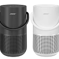 Dual Bose Black And White Portable Speakers With Handle And Cylindrical Design