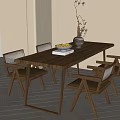 Wooden Dining Table Set with Woven Chairs Vase Flowers and Fruit Plate in Bright Interior