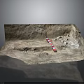 Archaeological Site Model Display With Sandy Ground Stone Artifacts And Red White Marker Pole