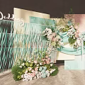 Wedding Decor With Pastel Backdrops Fringe And Colorful Flower Arrangements