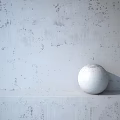 White Sphere Component Displayed on Textured Wall Platform with Minimalist Design 3d model