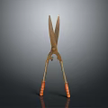 Vintage Brass Scissors With Long Metal Blades And Wooden Handles On Dark Background