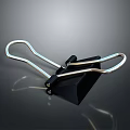 Black Binder Clip Office Supply With Sturdy Silver Metal Arms And Plastic Body