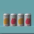 Four Tea Latte Cans With Yellow Pink Design On Light Blue Background