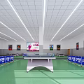 Indoor Table Tennis Fitness Space With Green Floor Blue Barriers And Bright Lighting