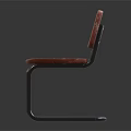Vintage Leisure Chair With Red Worn Seat Backrest And Metal Frame Design