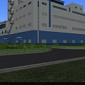 Modern Industrial Factory Building With Blue White Exterior Large Windows And Greenery