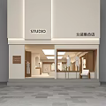 Modern Open Clothing Store Interior With White And Wooden Clothing Racks And Display Areas
