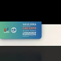 China Eurasia Expo Conference Venue With Podium Backdrop Tables Chairs And Water Bottles