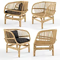 Set of Four Natural Rattan Leisure Chairs With Black Cushions And Armrests