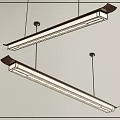 Modern Linear Pendant Light With Sleek Metal Frame Hanging Over Kitchen Island