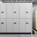 White Mobile Shelving Units With Black Circular Handles And Open Compartments In Industrial Storage Room