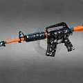 Toy Rifle With Black Camouflage Pattern And Orange Accents For Play