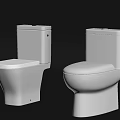 Two Modern White Toilets With Sleek Design In Bathroom Setting