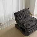 Modern Single Seater Sofa With Striped Velvet Upholstery And Unique Contoured Shape