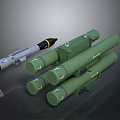 Military Weapon Featuring Missile With Gray Body And Four Green Launch Tubes